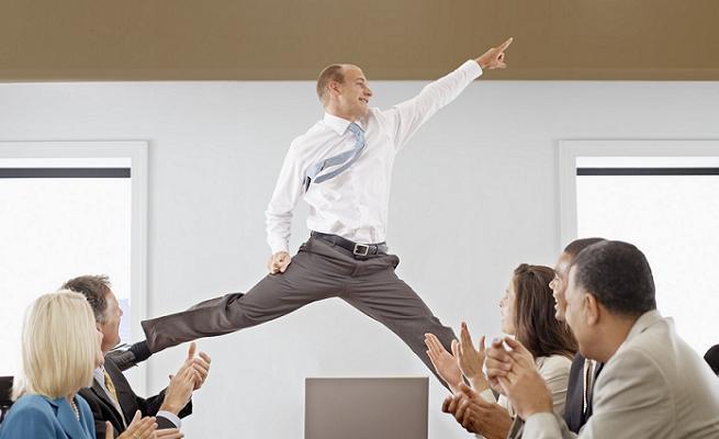 Businessman Midair in a Business Meeting