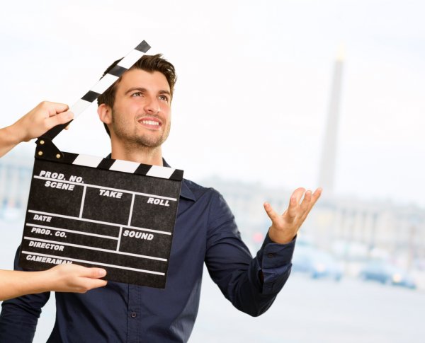 depositphotos_18778219-stock-photo-director-clapping-the-clapper-board